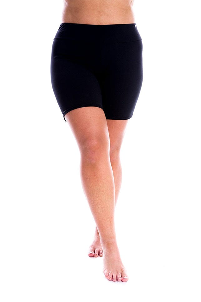 Model wearing black boyleg swim pant