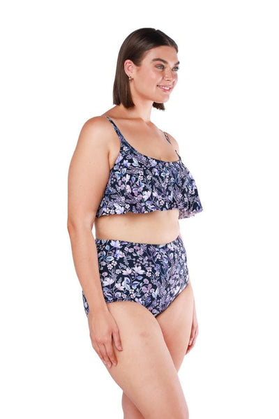 Brunette curvy model wearing navy floral bikini top with frill detail Australia