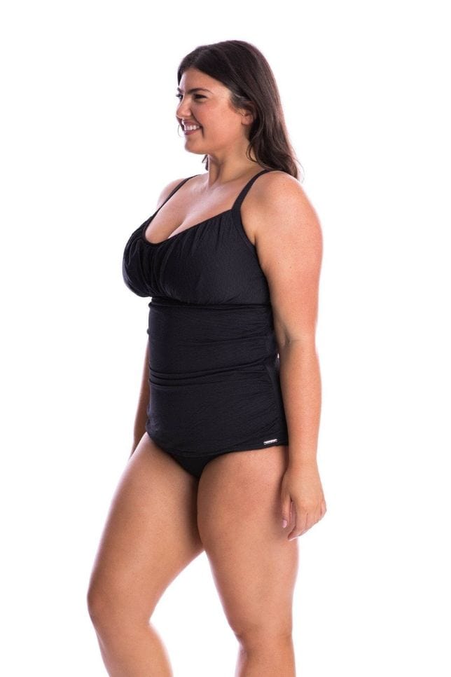Curve women wearing ruched tankini top with underwire and adjustable straps