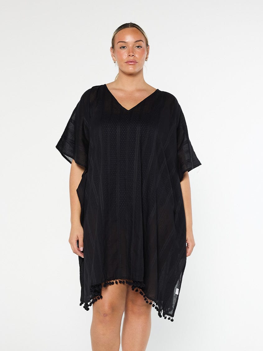 model wearing black cotton kaftan cover up