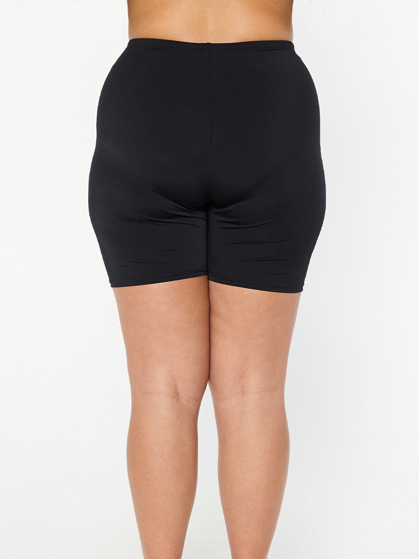 model showing back of chlorine resistant black bike pant