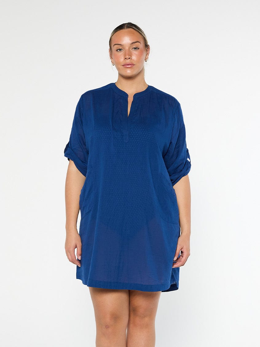 model wearing navy over shirt dress