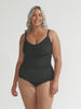 model wearing black underwire tankini with bust support