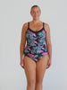 Video of model in studio wearing a underwire one piece in floral print