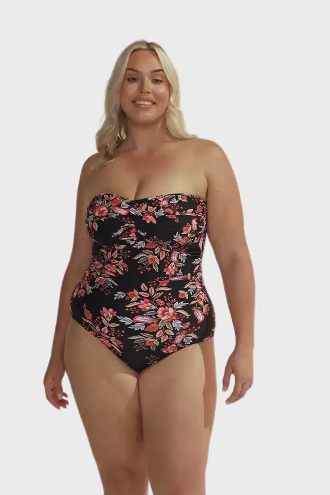 Video of model showing off strapless bandeau swimsuit with removable and adjustable straps for curve women in floral print 