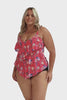 Model wearing hot pink floral 3 tier tankini top with black bottoms