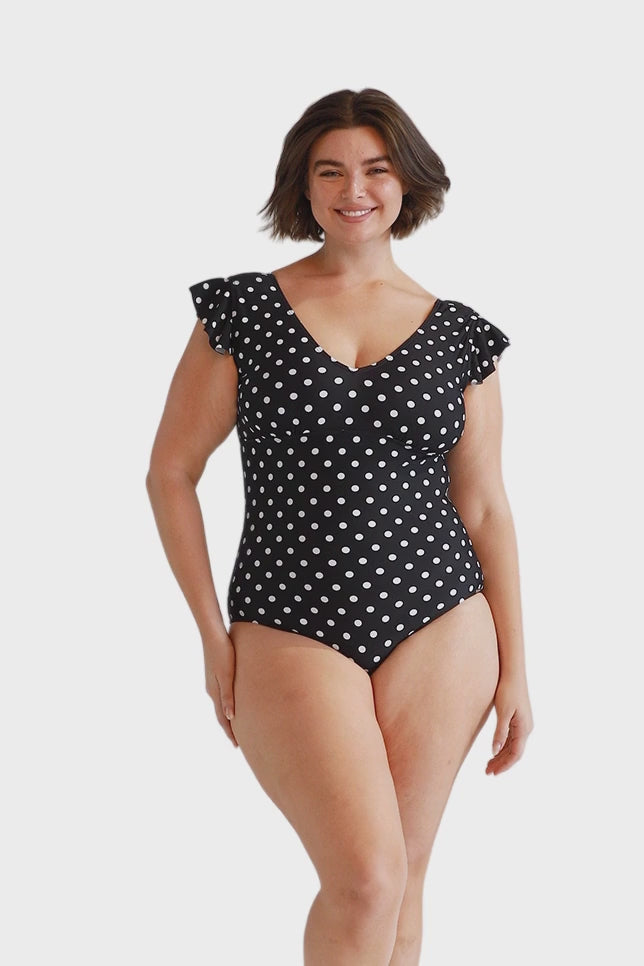 Video of black and white polkadot v neck plunge swimsuit with frill sleeve for curve women
