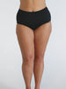 Curve woman in studio wearing chlorine resistant high waisted pant