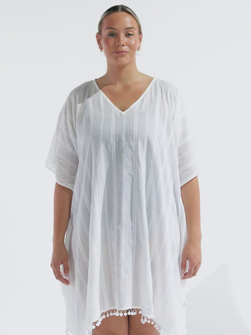 model wearing women's white cotton kaftan