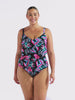 Video of model in studio wearing a 3 tiered ruffle one piece with pink blue floral print