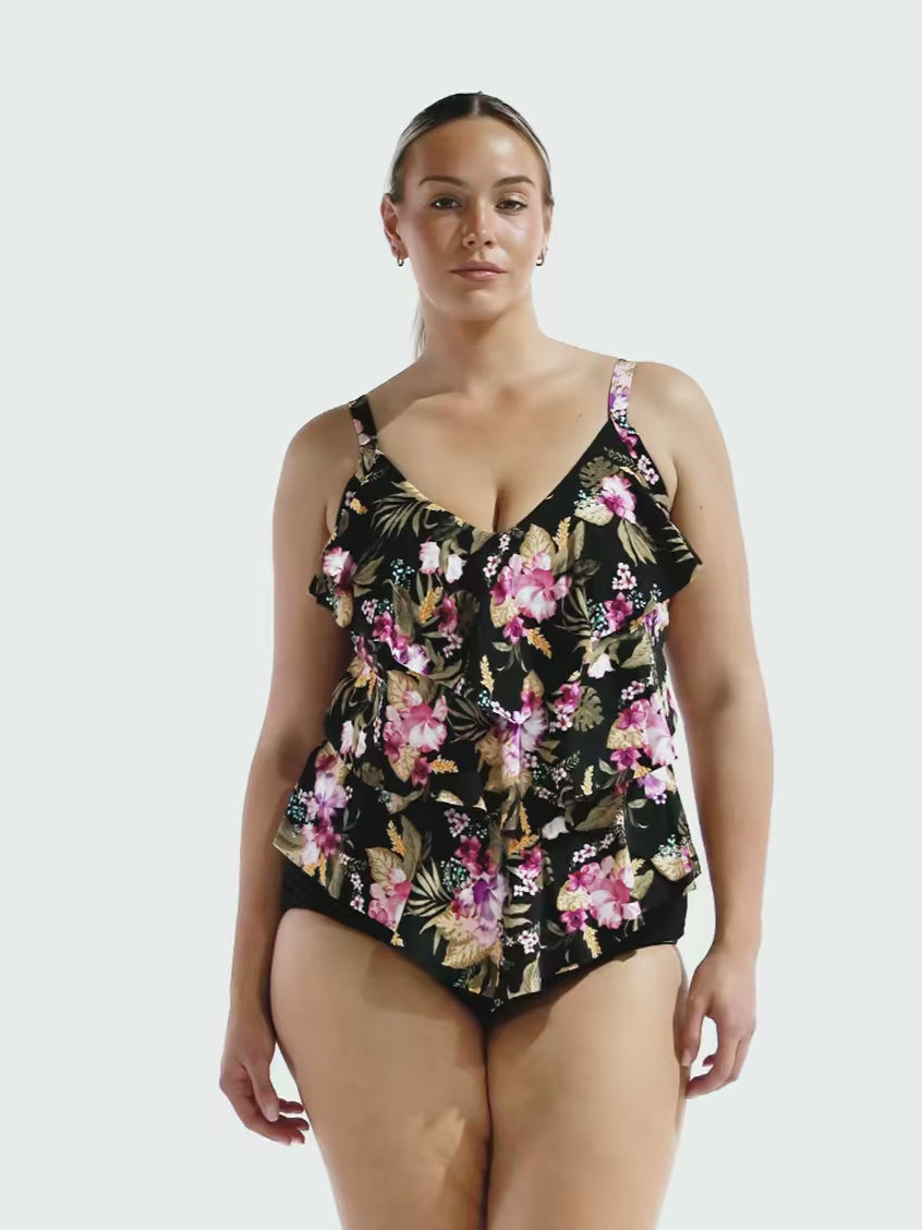 Blonde model in studio wearing a 3 tiered ruffle tankini top in chlorine resistent