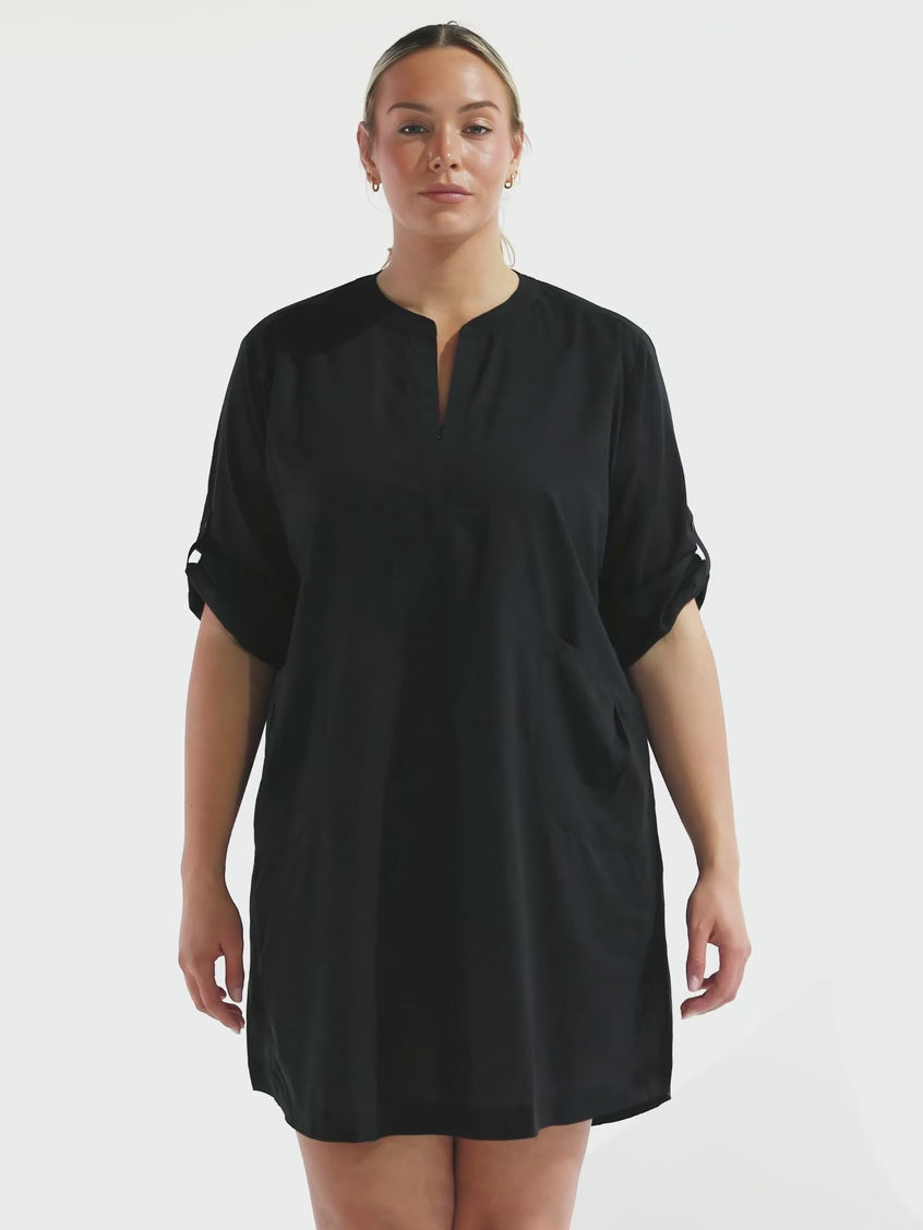 model wearing black over shirt beach dress