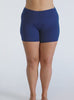 Model in studio wearing plus size chlorine resistant swim shorts