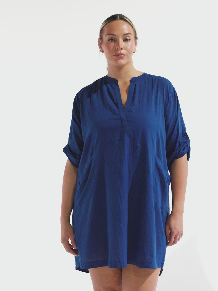 model wearing navy over shirt dress