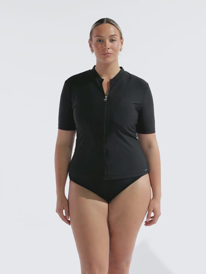 model wearing black short sleeve rash vest with zip