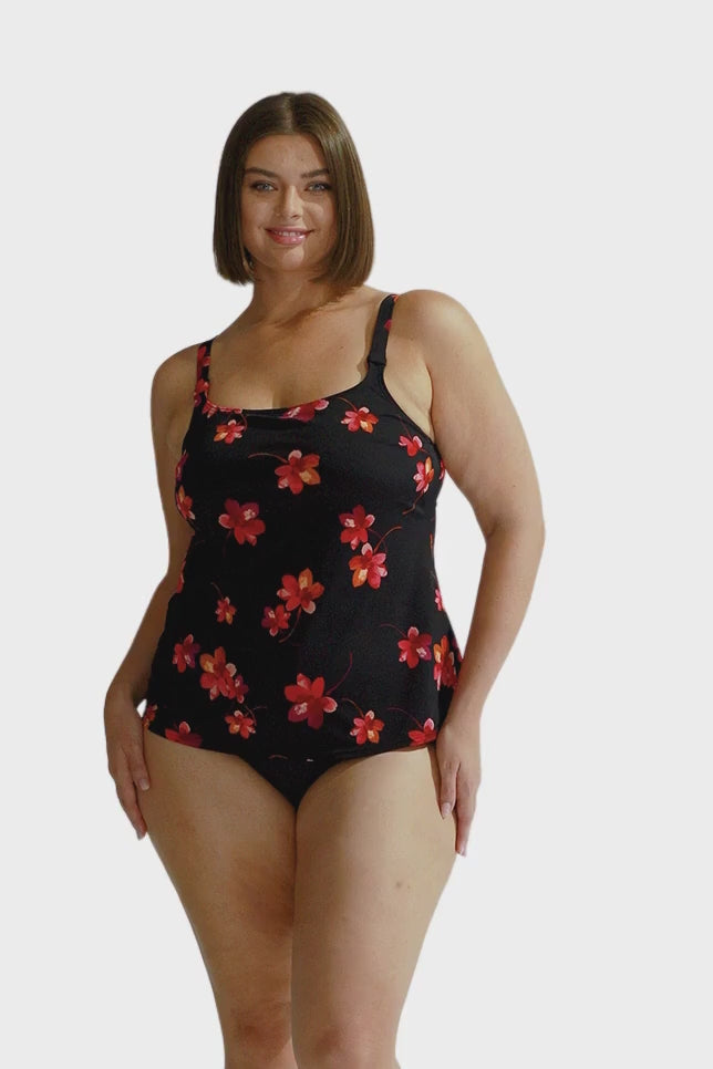 Brunette model wearing tank tankini top with pink flowers in chlorine resistant fabric
