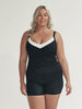 model wearing black and white textured swim tankini with bust support