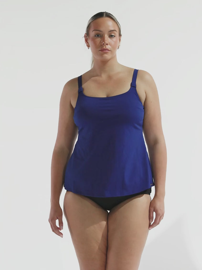Video of model wearing tank tankini top in navy chlorine resistant fabric