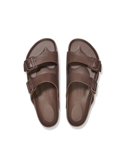 Pair of brown sandals on a white background