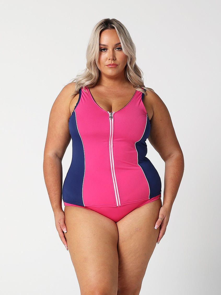 model wearing pink high waisted pant and matching tankini top