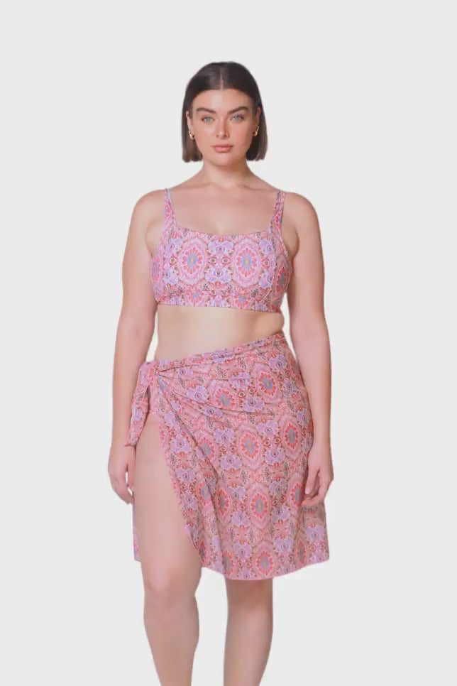 brunette plus size women wearing pink bohemian mesh sarong beach skirt