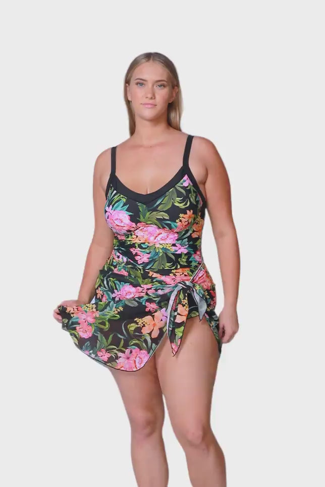 blonde plus size model wears lightweight mesh wrap skirt in tropical floral print