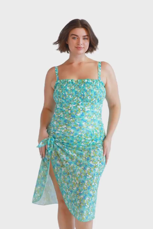 Brunette plus size model wears aqua blue light mesh wrap sarong