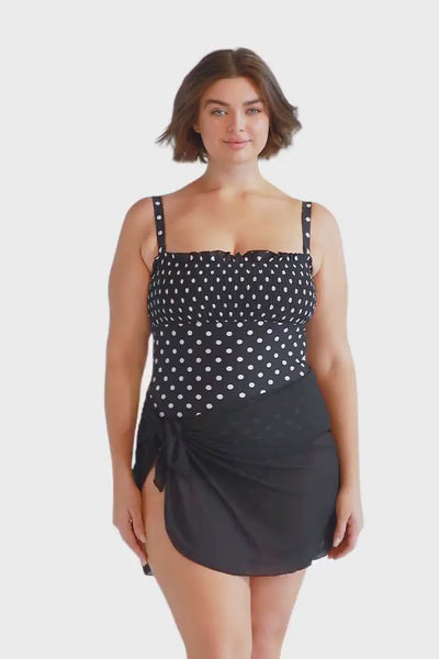 Brunette plus size model wears black mesh short wrap skirt