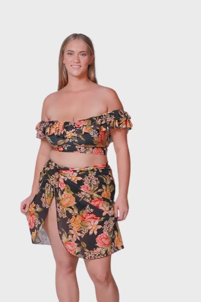 blonde plus size women wearing black and yellow floral tie side mesh beach skirt