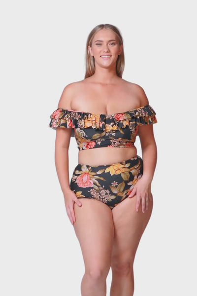 Curve model wearing off the shoulder floral bikini top with ruffle detail