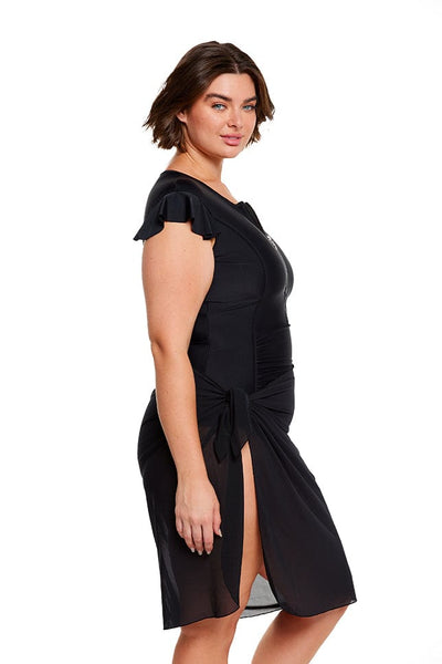 brunette model wears black mesh wrap beach sarong