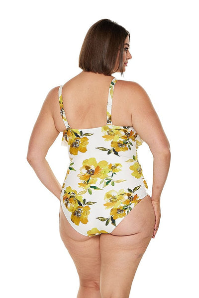 Brunette model wearing yellow model v neck ruffle swimsuit for curve model