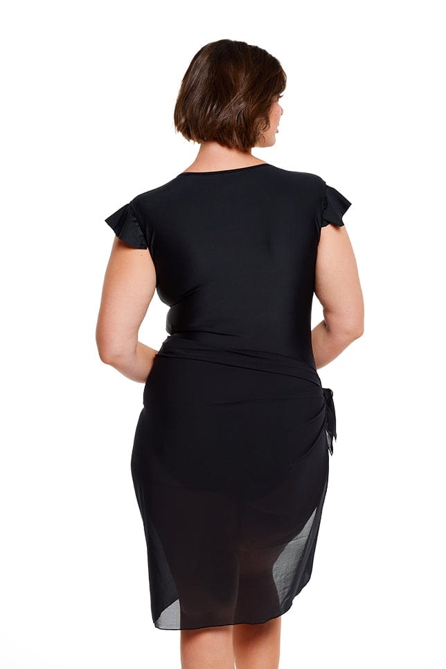 plus size brunette model wears long wrap tie skirt in black mesh fabric