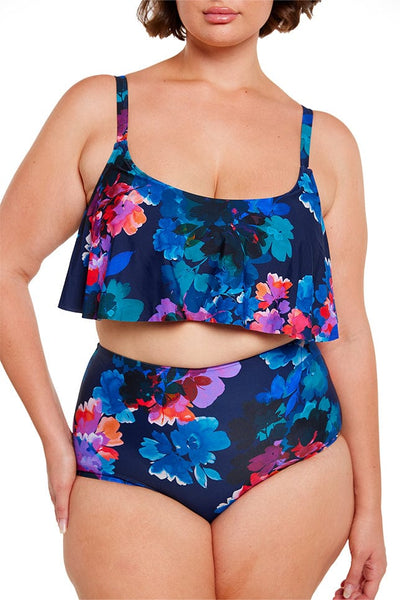 Detail image of a plus size model wearing tones of navy, pink and purple floral printed bikini top with long frill detail