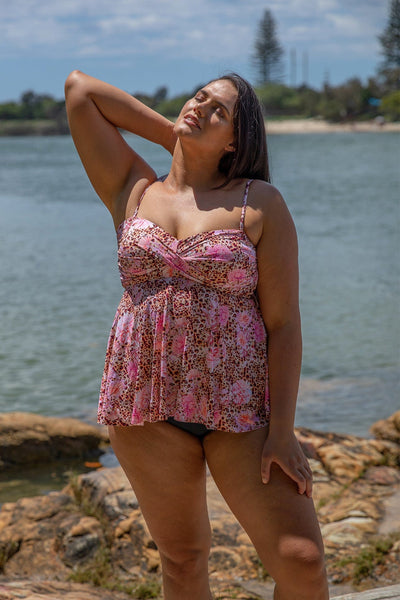 Brunette model wearing sunseeker Strapless Underwire Tankini Top