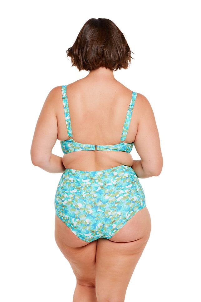 brunette plus size women wears tummy control high waisted bikini bottom