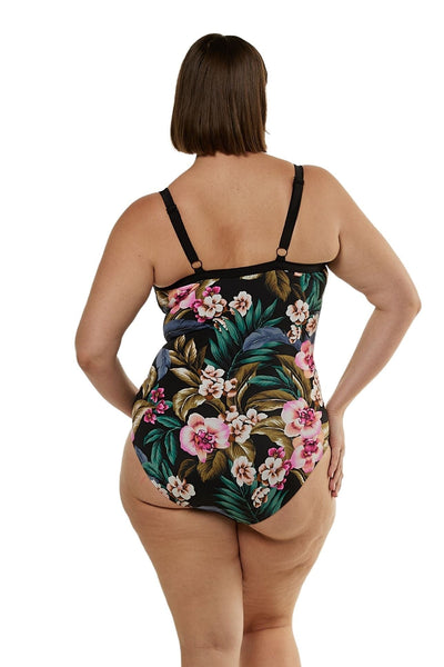 Back profile of curve model wearing built in bra tropical printed swimsuit