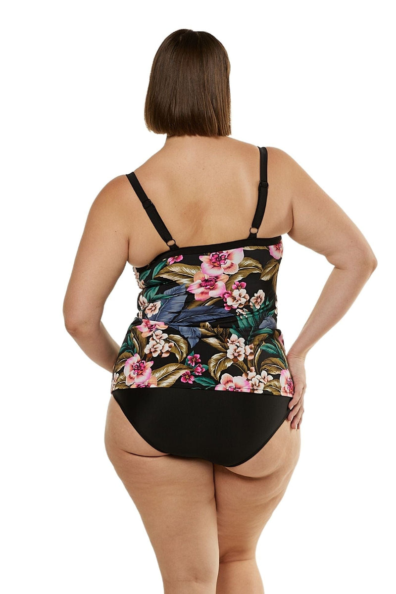 Back of curve model wearing a black floral printed tankini top with adjustable back straps 
