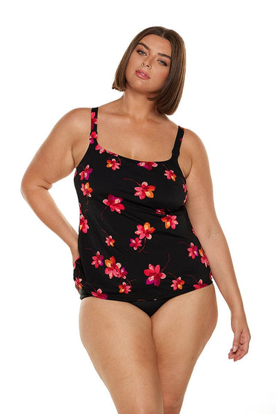 Brunette model wears pink floral chlorine resistant tank tankini top