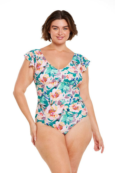 Brunette model wears teal supportive v neck frill one piece in teal floral print