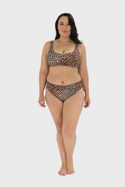 Video of model wearing animal print bikini top with scoop front