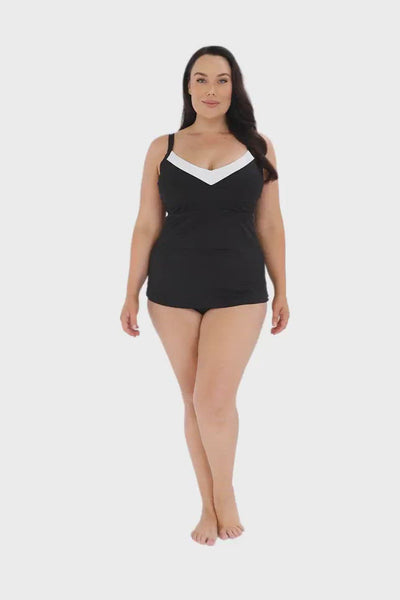 Product video of model wearing black and white underwire plus size tankini top