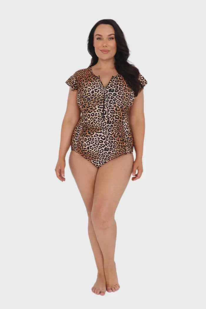 Video of model wearing animal print frill sleeve one piece