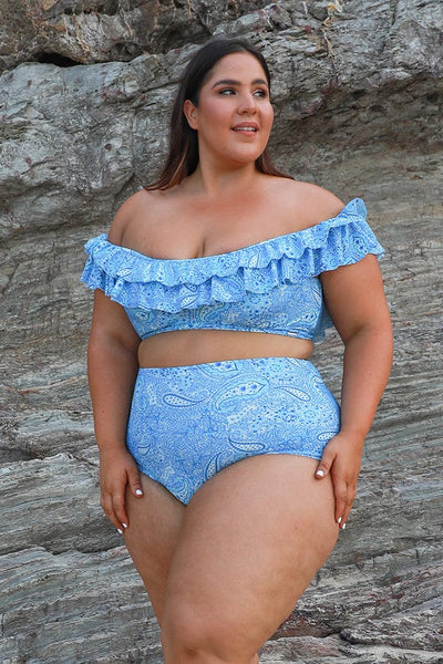 brunette model wears plus size paisley sky blue print with double frill detail on the top