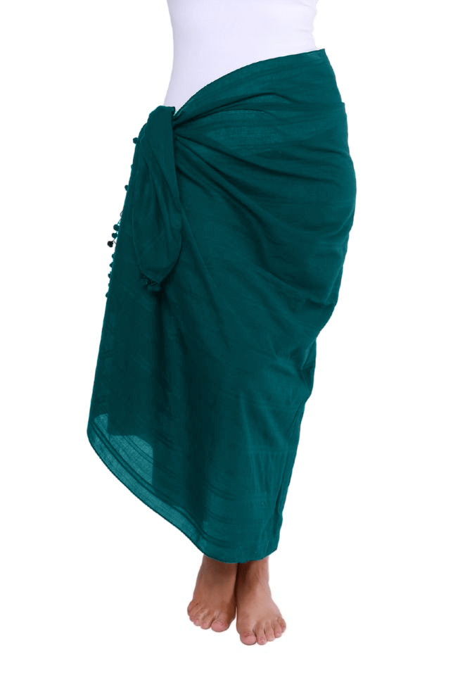 model wearing teal coloured sarong