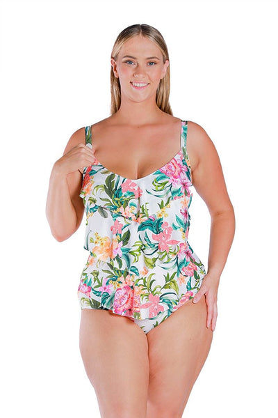 blonde plus size model wears white floral 3 tier ruffle one piece