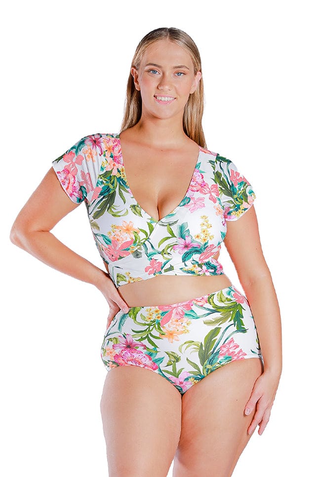 blonde plus size model wears cute cap sleeve bikini top in white floral print